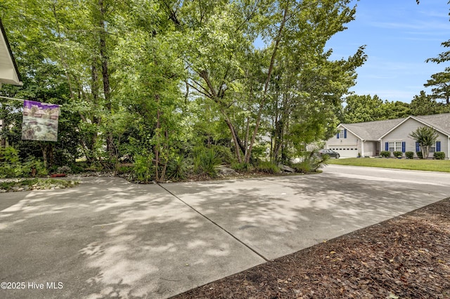 208 Bloomington Ln, Wilmington, NC 28411 - view of patio / terrace featuring driveway