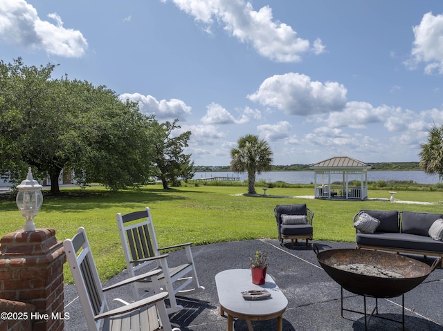 4 Hunter Heath Dr, North Topsail Beach, NC 28460 - view of patio with a gazebo and a water view