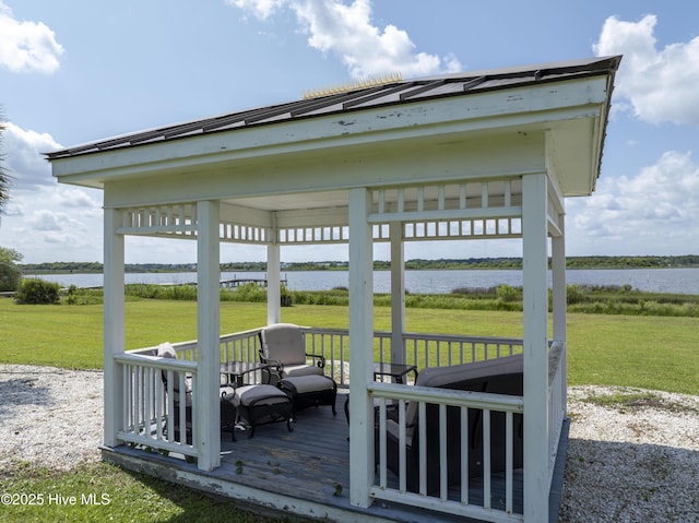 4 Hunter Heath Dr, North Topsail Beach, NC 28460 - deck with a water view and a yard