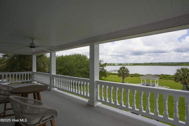 4 Hunter Heath Dr, North Topsail Beach, NC 28460 - balcony featuring a water view and a ceiling fan