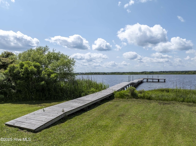 4 Hunter Heath Dr, North Topsail Beach, NC 28460 - dock area with a water view and a yard