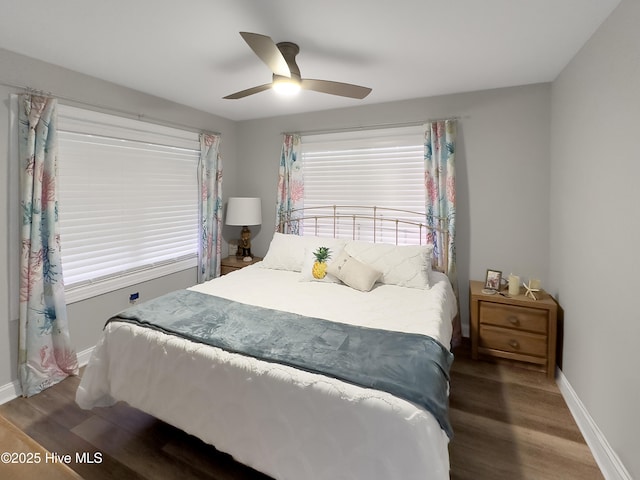 7411 Ocean Dr Unit E & W, Emerald Isle, NC 28594 - bedroom featuring wood finished floors, baseboards, and a ceiling fan