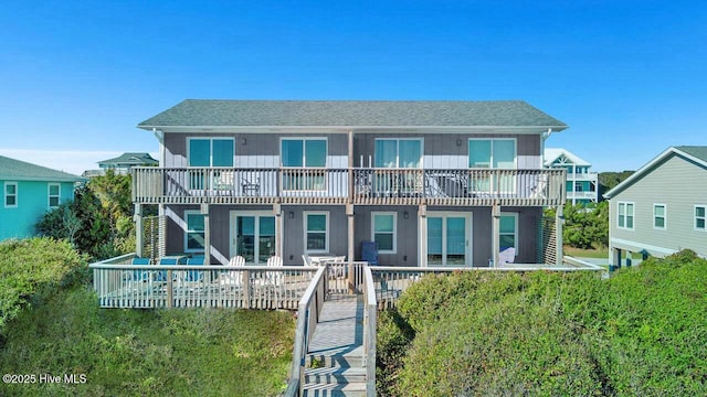7411 Ocean Dr Unit E & W, Emerald Isle, NC 28594 - back of house featuring a deck and a shingled roof