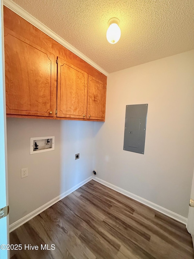 2104 Flagstone Ct Unit A-4, Greenville, NC 27834 - washroom featuring electric panel, dark wood-style floors, a textured ceiling, hookup for a washing machine, and cabinet space
