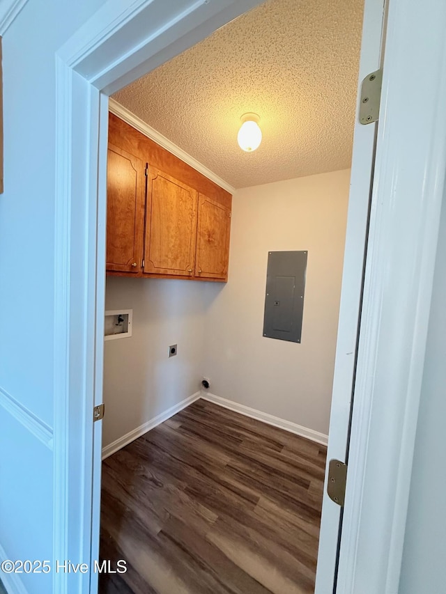 2104 Flagstone Ct Unit A-4, Greenville, NC 27834 - washroom with electric panel, cabinet space, hookup for a washing machine, a textured ceiling, and dark wood-style flooring