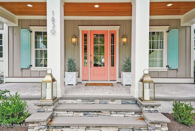 1830 Senova Trce, Wilmington, NC 28405 - view of exterior entry featuring a porch and board and batten siding