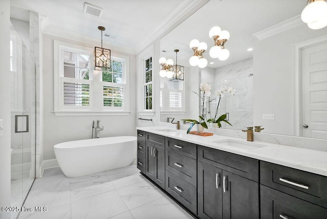 1830 Senova Trce, Wilmington, NC 28405 - full bathroom with crown molding, a chandelier, a marble finish shower, double vanity, and a freestanding bath