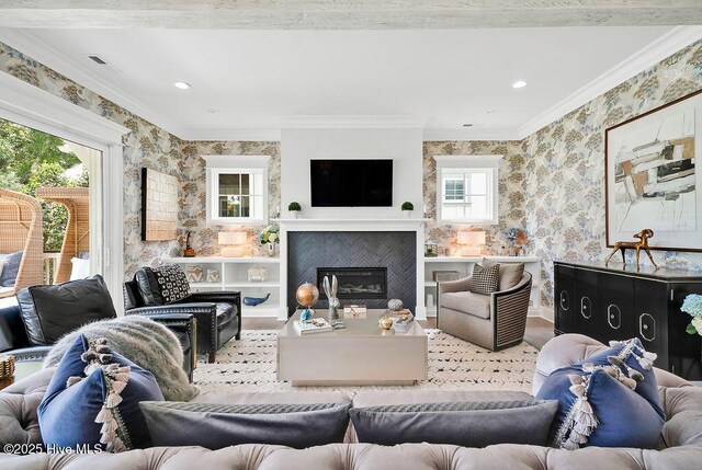 1830 Senova Trce, Wilmington, NC 28405 - living area with wallpapered walls, ornamental molding, a fireplace, recessed lighting, and wood finished floors
