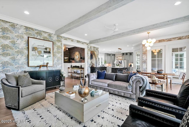1830 Senova Trce, Wilmington, NC 28405 - living area with ornamental molding, wood finished floors, wallpapered walls, beam ceiling, and a chandelier