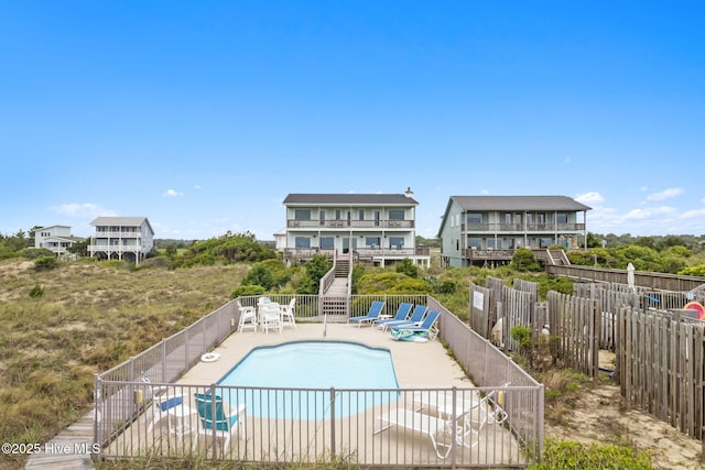 1239 Ocean Blvd W, Holden Beach, NC 28462 - community pool with a patio area
