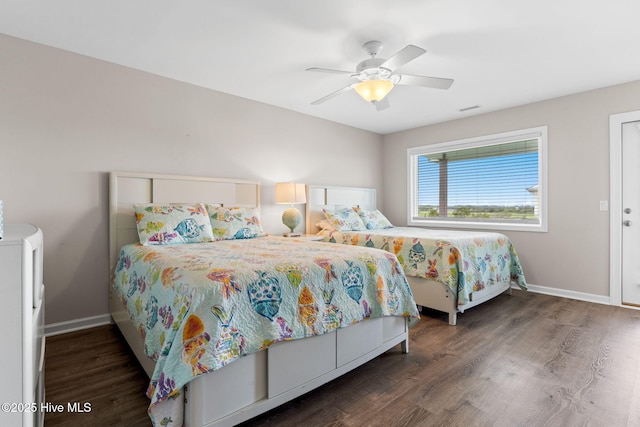 1239 Ocean Blvd W, Holden Beach, NC 28462 - bedroom with wood finished floors and ceiling fan