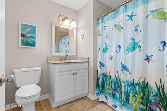 1239 Ocean Blvd W, Holden Beach, NC 28462 - full bath with tile patterned floors, vanity, and a shower with shower curtain