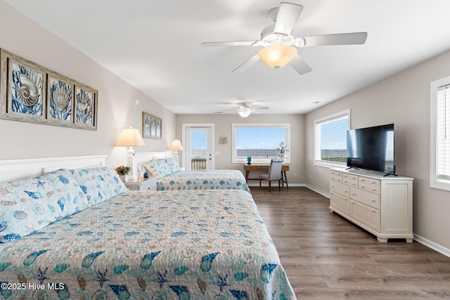 1239 Ocean Blvd W, Holden Beach, NC 28462 - bedroom featuring wood finished floors, access to exterior, and a ceiling fan