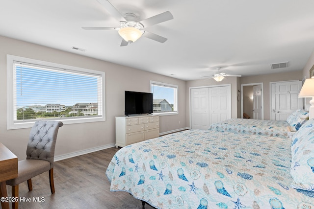 1239 Ocean Blvd W, Holden Beach, NC 28462 - bedroom with wood finished floors and a ceiling fan