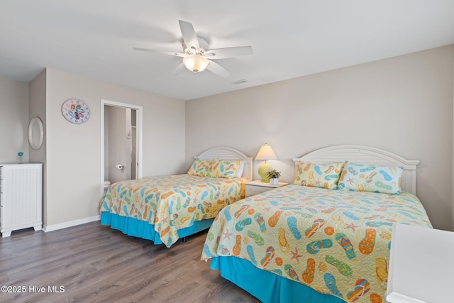 1239 Ocean Blvd W, Holden Beach, NC 28462 - bedroom featuring wood finished floors and ceiling fan