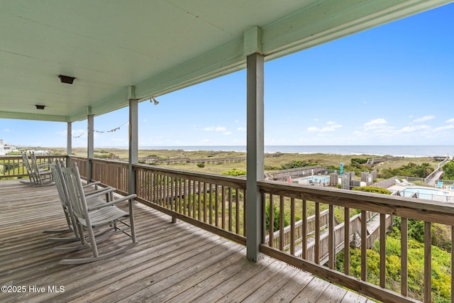 1239 Ocean Blvd W, Holden Beach, NC 28462 - wooden terrace featuring a water view