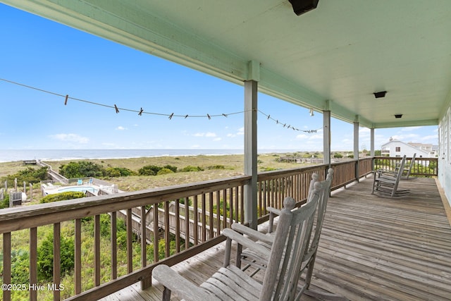 1239 Ocean Blvd W, Holden Beach, NC 28462 - wooden terrace featuring a water view