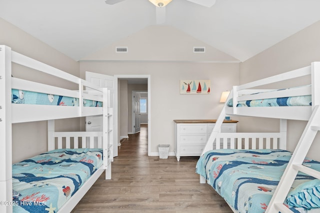 1239 Ocean Blvd W, Holden Beach, NC 28462 - bedroom with wood finished floors, vaulted ceiling, and a ceiling fan