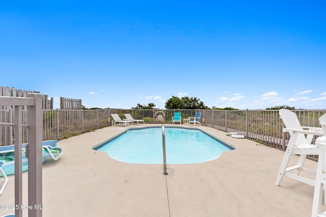1239 Ocean Blvd W, Holden Beach, NC 28462 - view of pool featuring a patio area