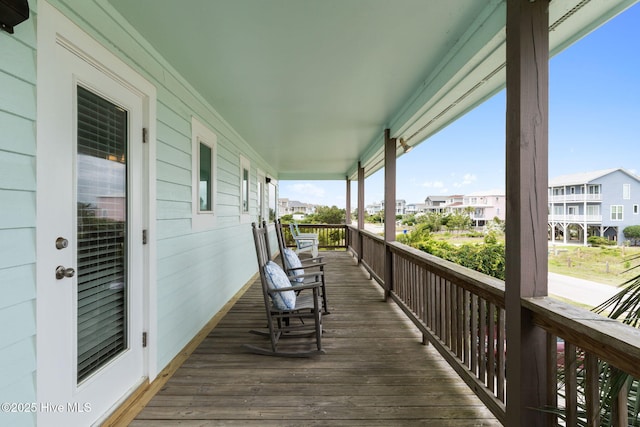 1239 Ocean Blvd W, Holden Beach, NC 28462 - wooden terrace with a residential view
