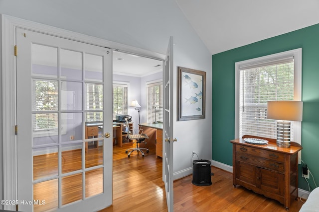 5752 Gardenia Ln, Wilmington, NC 28409 - office space featuring vaulted ceiling, light wood-style flooring, baseboards, and ornamental molding