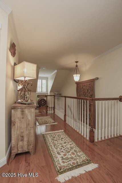 1 Burton Pl, Jacksonville, NC 28540 - sitting room with wood finished floors, ornamental molding, and an upstairs landing