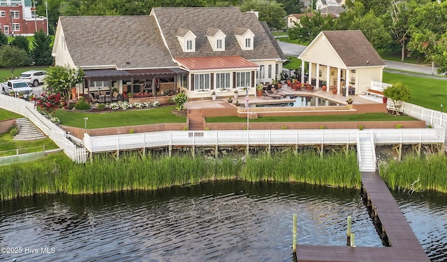 1 Burton Pl, Jacksonville, NC 28540 - back of property featuring a water view and a patio area