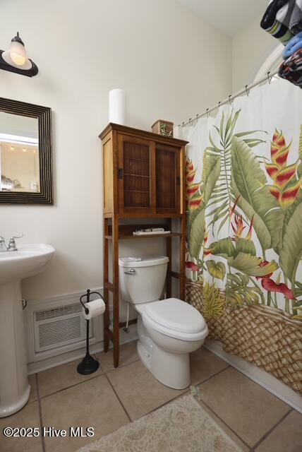 1 Burton Pl, Jacksonville, NC 28540 - bathroom with tile patterned flooring and curtained shower