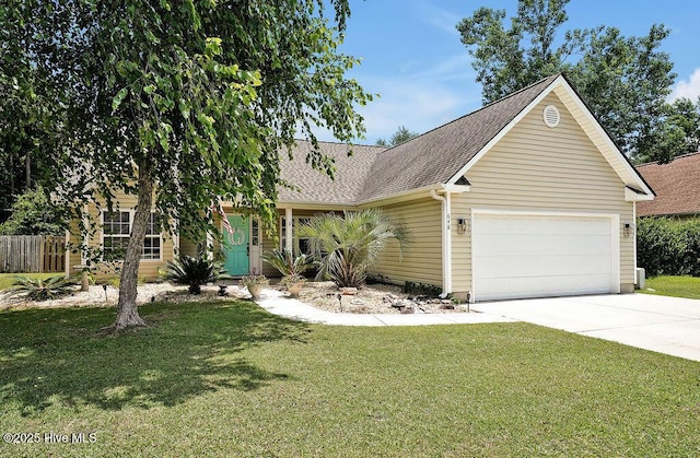 648 Pine Branches Cir SE, Leland, NC 28451 - view of front facade with an attached garage, a shingled roof, and driveway