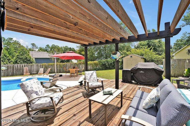 648 Pine Branches Cir SE, Leland, NC 28451 - deck with grilling area, a storage unit, a fenced backyard, and outdoor dining area