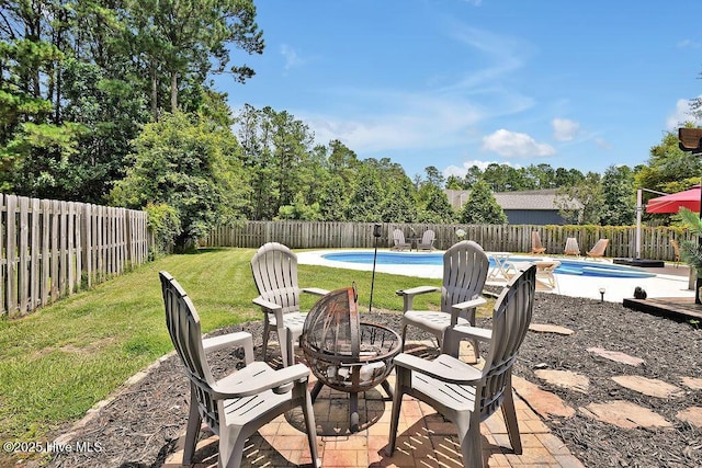 648 Pine Branches Cir SE, Leland, NC 28451 - fenced backyard featuring an outdoor fire pit and a patio