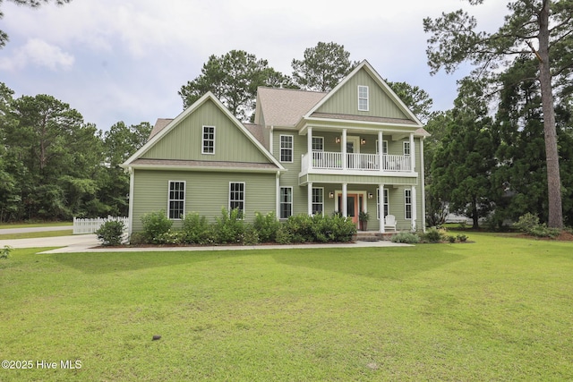 637 White Oak Xing, Swansboro, NC 28584 - craftsman-style house featuring covered porch, a balcony, a front yard, board and batten siding, and a chimney