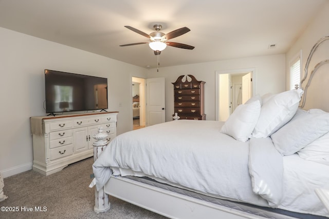 637 White Oak Xing, Swansboro, NC 28584 - carpeted bedroom with a ceiling fan and baseboards
