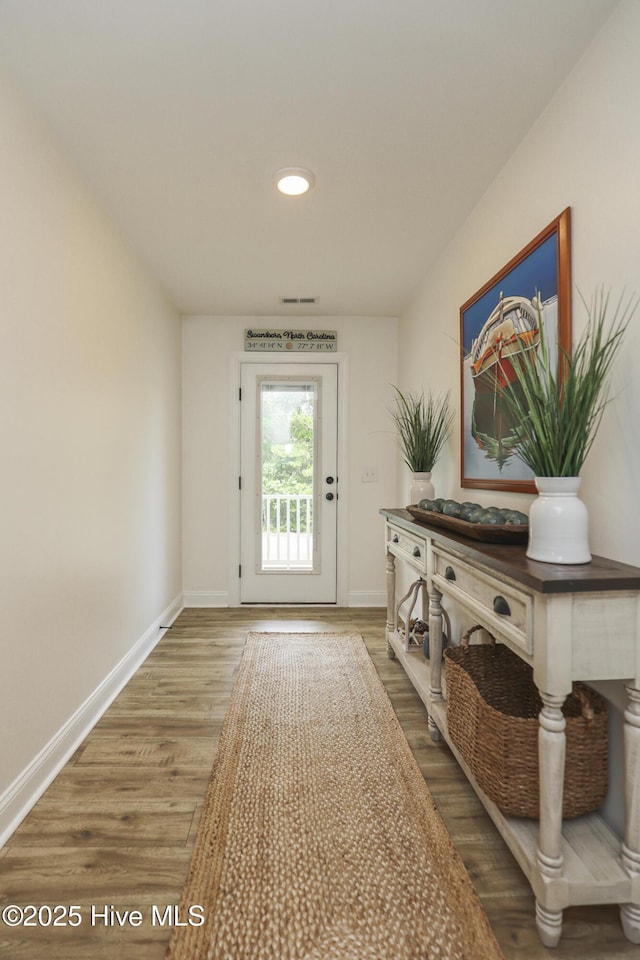 637 White Oak Xing, Swansboro, NC 28584 - doorway with wood finished floors and recessed lighting