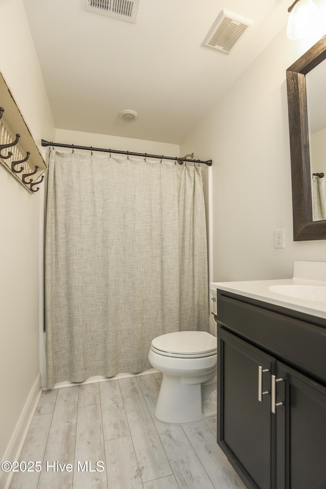 637 White Oak Xing, Swansboro, NC 28584 - full bath with vanity and wood finished floors