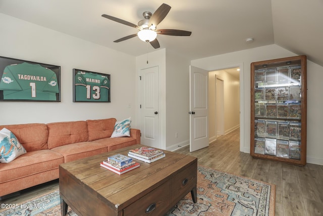637 White Oak Xing, Swansboro, NC 28584 - living area featuring a ceiling fan, wood finished floors, and lofted ceiling