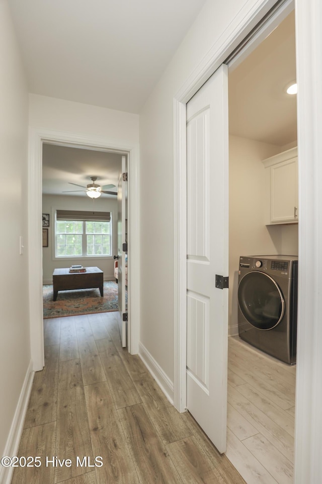 637 White Oak Xing, Swansboro, NC 28584 - corridor with washer / dryer and light wood-type flooring