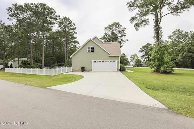 637 White Oak Xing, Swansboro, NC 28584 - view of side of property featuring an attached garage, driveway, and roof with shingles
