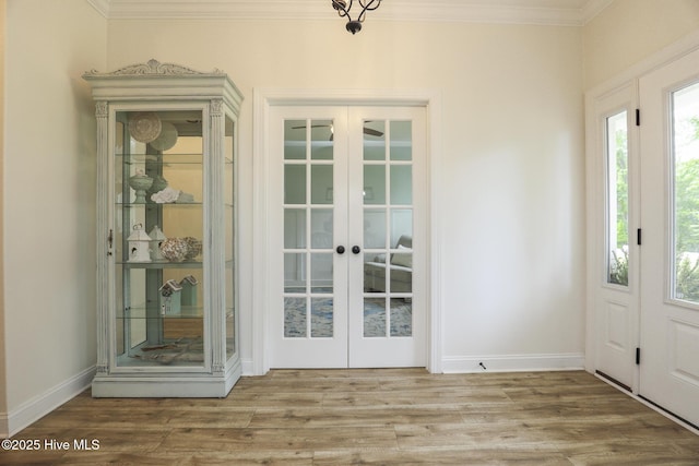 637 White Oak Xing, Swansboro, NC 28584 - entryway with french doors, crown molding, and wood finished floors