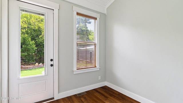 359 N Leak St, Southern Pines, NC 28387 - doorway to outside with dark wood-style flooring and baseboards