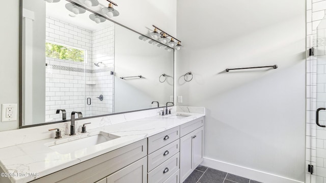 359 N Leak St, Southern Pines, NC 28387 - bathroom with double vanity, a stall shower, and tile patterned flooring