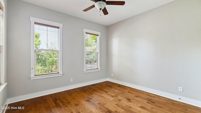 359 N Leak St, Southern Pines, NC 28387 - spare room with wood finished floors, ceiling fan, and baseboards
