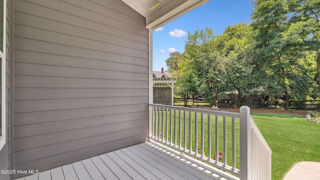 359 N Leak St, Southern Pines, NC 28387 - wooden terrace featuring a yard