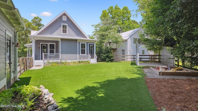 359 N Leak St, Southern Pines, NC 28387 - rear view of house featuring covered porch