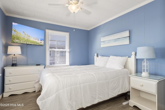 901 Ocean Dr, Emerald Isle, NC 28594 - bedroom featuring ornamental molding, wood finished floors, and a ceiling fan