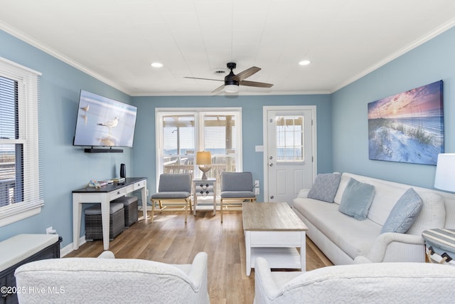 901 Ocean Dr, Emerald Isle, NC 28594 - living area featuring a ceiling fan, crown molding, recessed lighting, wood finished floors, and baseboards