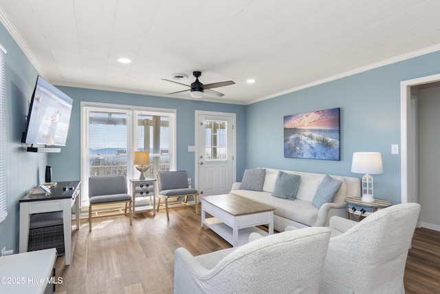 901 Ocean Dr, Emerald Isle, NC 28594 - living room featuring ornamental molding, ceiling fan, wood finished floors, and recessed lighting
