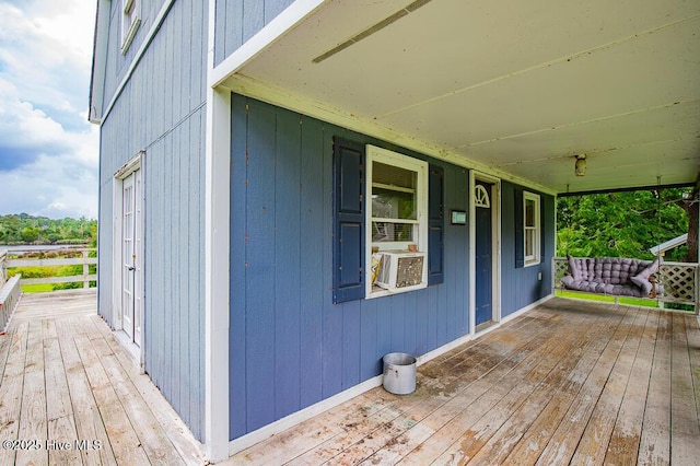 503 Vandemere Rd, Bayboro, NC 28515 - wooden porch featuring cooling unit
