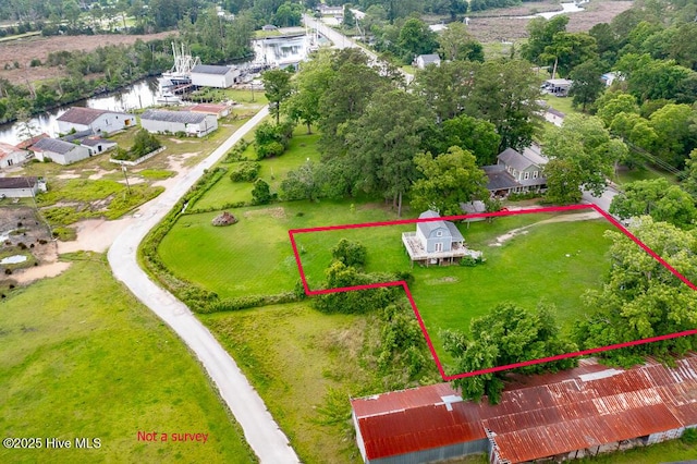 503 Vandemere Rd, Bayboro, NC 28515 - aerial view of property and surrounding area with property parcel outlined and a tree filled landscape