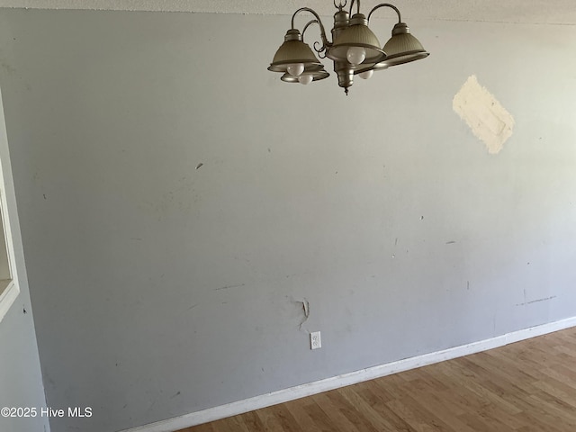 102 Tanglewood Dr, Jacksonville, NC 28540 - detailed view of a chandelier and wood finished floors